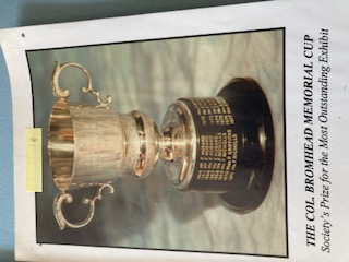 Image of Col Bromhead Memorial Cup Rosette and Certificate